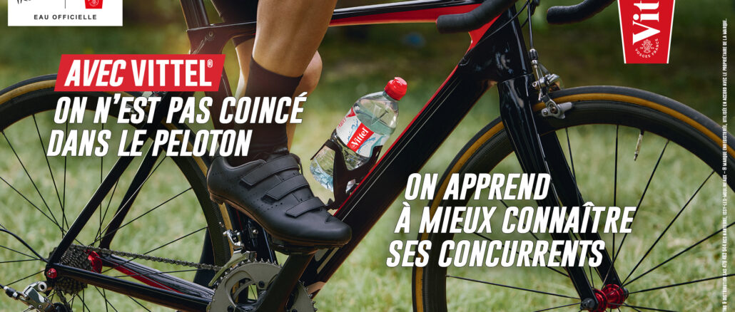 Cycliste avec une bouteille Vittel sur son vélo, visuel de la campagne Vittel Tour de France 2026.