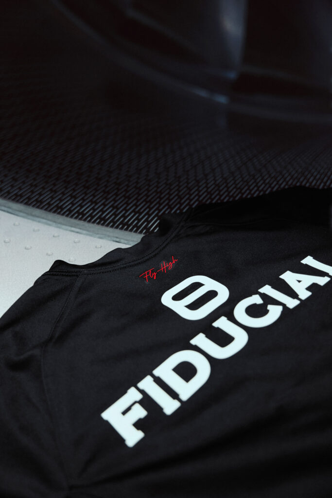 Dos du maillot domicile 2026-2027 du Stade Toulousain avec la signature Fly High brodée en rouge et le sponsor Fiducial