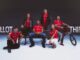 Joueurs du Stade Toulousain et jeunes Toulousains posant autour d'un banc public avec le maillot third rouge 2026-2027