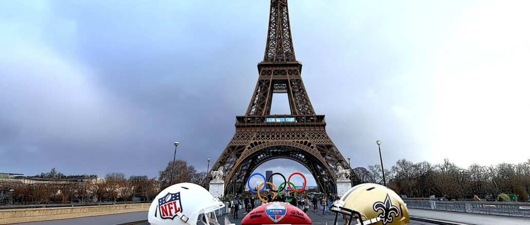 Casques de la NFL et des New Orleans Saints et ballon du NFL Paris Game devant la tour Eiffel